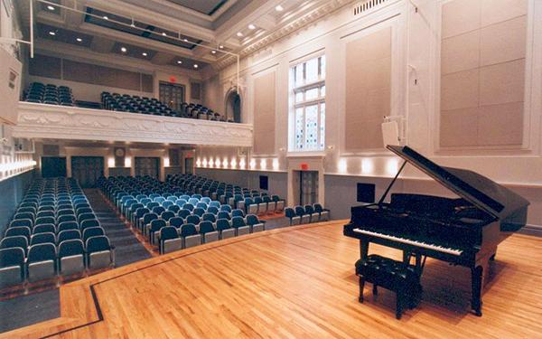 concert hall with piano on stage